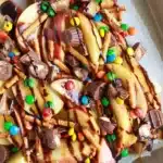 Caramel Apple Nacho Bar fully loaded with caramel sauce, chocolate and candies