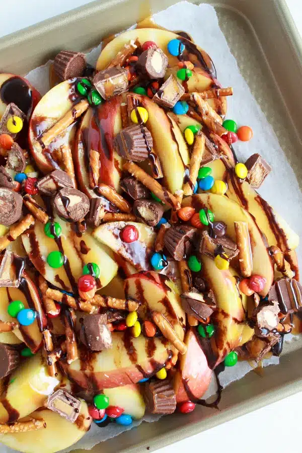 Caramel Apple Nacho Bar fully loaded with caramel sauce, chocolate and candies